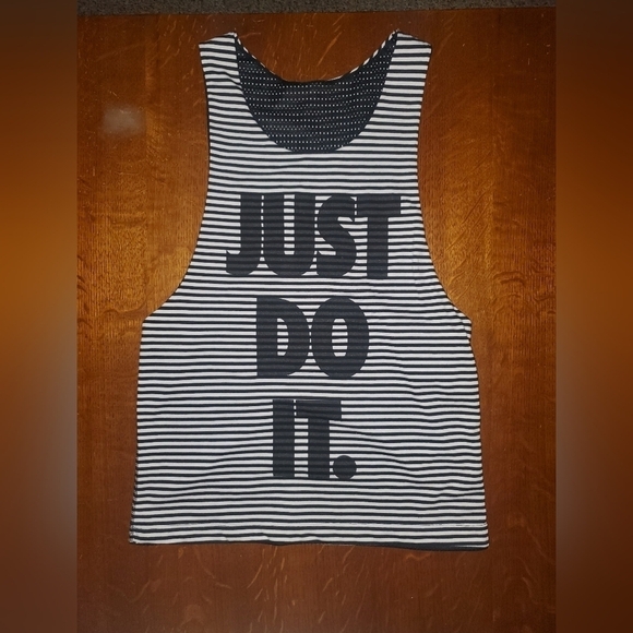 Nike Tops - Nike Women Black and White Reversible tank top.